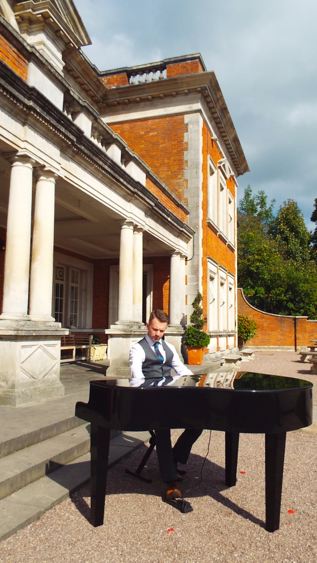 Wedding Pianist Craig Smith playing his Portable Grand Piano at a wedding at Eaves Hall Lancashire
